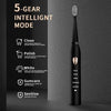 A black ultrasonic electric toothbrush with a textured head is shown next to a display detailing five cleaning modes.