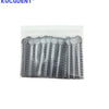 A clear plastic bag containing numerous silver orthodontic elastic ligature ties for braces.
