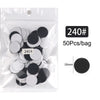 Sac en plastique transparent contenant 50 disques de ponçage noirs et argentés remplaçables pour les soins des pieds.