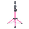 A pink adjustable wig stand tripod with a black adjustable top and stable base.