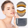 A woman is shown using a wooden lymphatic contour face brush for facial sculpting.
