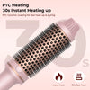 A pink ceramic curling iron with black bristles shown next to icons indicating even heat and 30s fast heat.