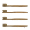 A set of four bamboo toothbrushes with natural bristles shown horizontally.