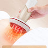 A hand is using an electric meridian brush for muscle relaxation, showing temperature levels from 35-45°C to 55-65°C.