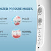 A close-up of a white portable oral irrigator device showing four pressure modes: Custom, Pulse, Soft, and Normal.