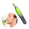 A close-up view of a green and silver rechargeable nose and ear hair trimmer device.