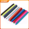 A collection of dental orthodontic elastic ligature ties in various colors laid out for display.