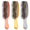 Three views of a Japanese-style scalp massage brush comb for hair styling and relaxation in pink, gold, and silver.