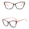 Pink cat eye reading glasses with a tortoiseshell pattern and pink frames