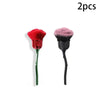 A pair of red rose and flower nail art dust brushes.