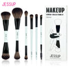 A box and six individual makeup brushes from the Jessup Lover Collection V set.
