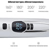 Close-up of a silver hair straightener iron with temperature settings and control buttons.