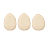 Three beige mini finger puff foundation applicator tools arranged horizontally.