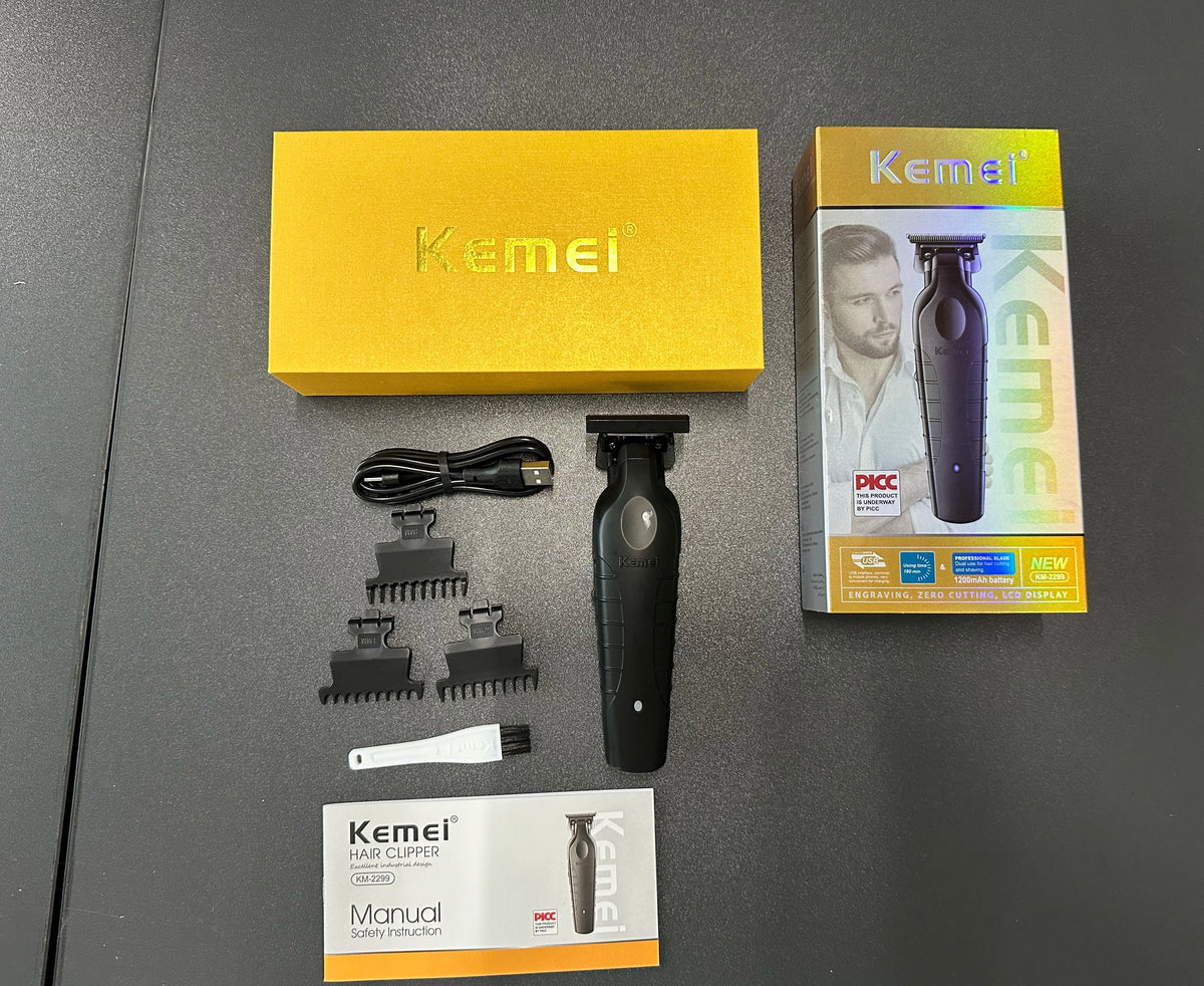 A set of Kemei professional cordless electric hair clippers, including the main unit and accessories, displayed on a dark sur
