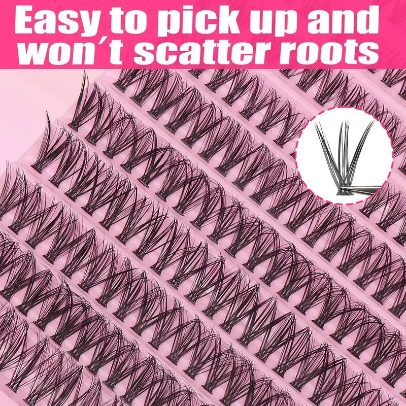 Gros plan d'un ensemble d'ongles à cils DIY, avec de fines cils foncés sur fond rose.