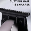 Close-up view of a black electric clipper with a cutter head, showing the teeth and housing.