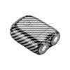 A close-up view of a mini electric beard trimmer shaver with a black and white chevron pattern.