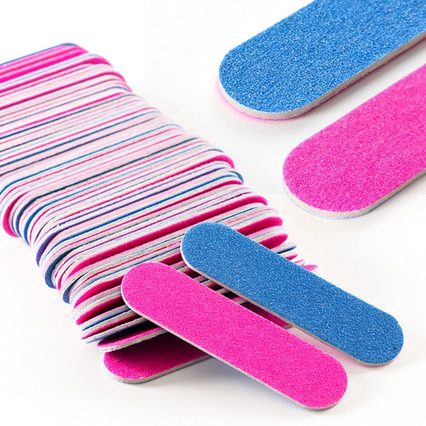 A collection of double-sided mini nail files in pink and blue colors are displayed on a white background.