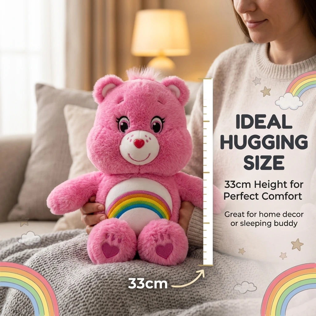 A pink classic care bears plush stuffed animal is shown next to a measuring scale, demonstrating its 33cm size.