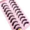 Un plateau en plastique rose contenant diverses styles de faux cils de renard noirs.