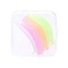 A clear plastic case containing a set of five colored eyelash curler and lifting tools.