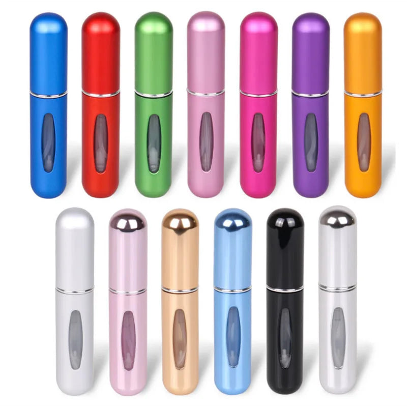 A collection of various portable mini perfume refill sprays in different colors and finishes.