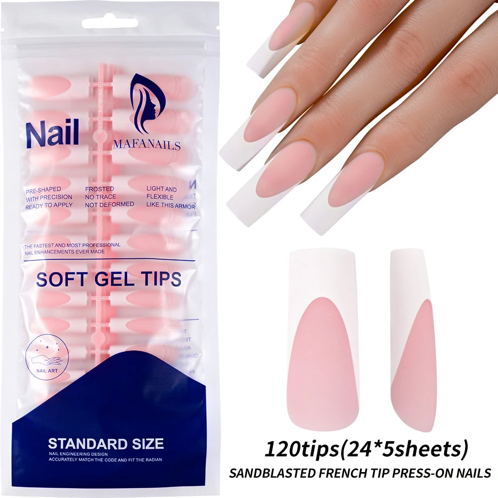 A set of nude pink matte french press-on nails with a glossy finish shown on fingers.