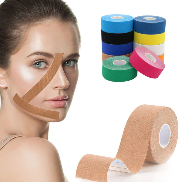 Rolls of colorful kinesiology tape and a roll of tan kinesiology tape for wrinkle reduction