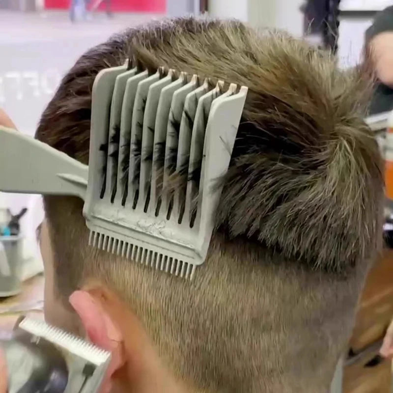 A person is using a professional V-shaped hair cutting comb set on their hair.