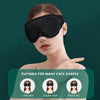 A woman wearing a black 3D sleeping eye mask demonstrating its suitability for different face shapes.