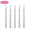 A set of five mini brow and eyelash combs in white.