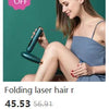A woman is using a folding laser hair removal epilator on her leg.