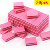 A pile of 50 pink and white multi-sided nail and cuticle buffing files.