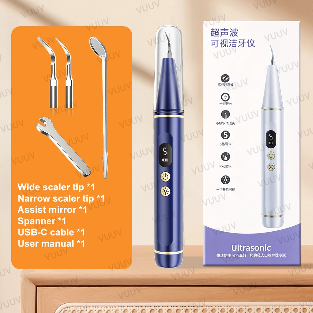 A purple ultrasonic dental scaler tool and various related dental instruments are displayed on a wooden surface.