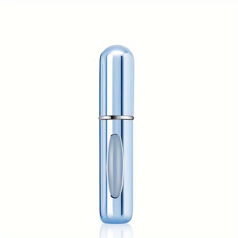 A slender, metallic blue perfume atomizer bottle with a silver cap and a clear oval refill section.