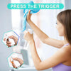 A woman is pressing a trigger on a blue cloth to activate a high-pressure mist spray bottle.