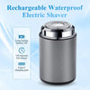 A silver rechargeable waterproof electric shaver with a Type-C charging port shown against a light blue background.