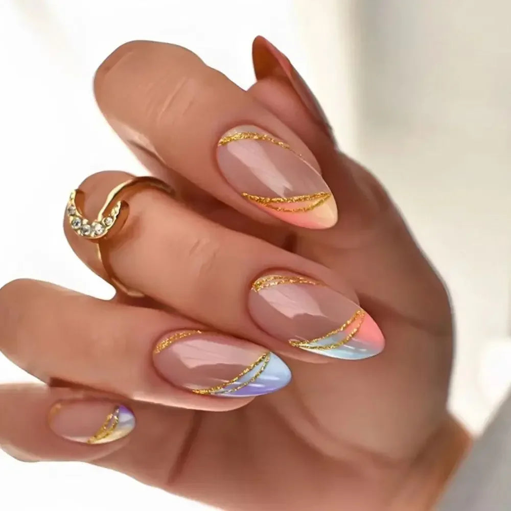 A hand displays press-on false nails with a French wavy design featuring soft pink and iridescent gradient accents.