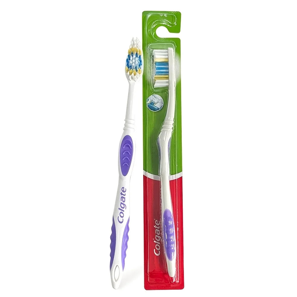 A package containing a green toothbrush and a white toothbrush inside, labeled Colgate.