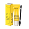 Tube jaune de colle pour cils Rave Lady et sa boîte.