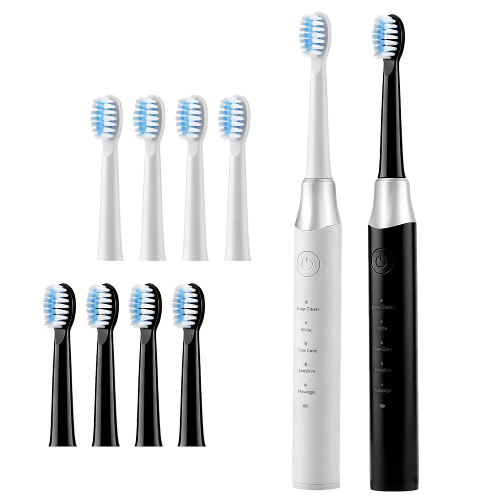 A set of professional electric toothbrushes in black and white, showing various brush heads and the main device.