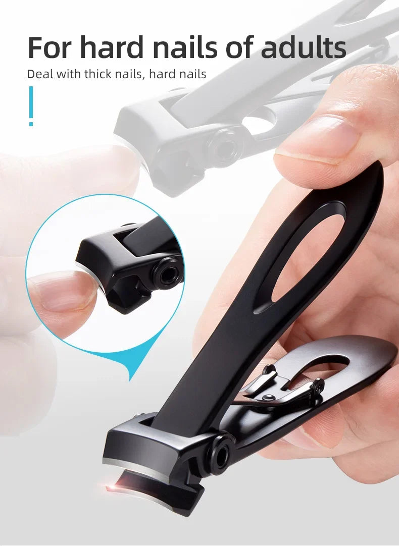 A hand holds a black professional stainless steel nail clipper designed for hard nails.