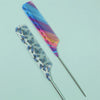 A set of anti-static rat tail combs featuring iridescent blue and purple colors.