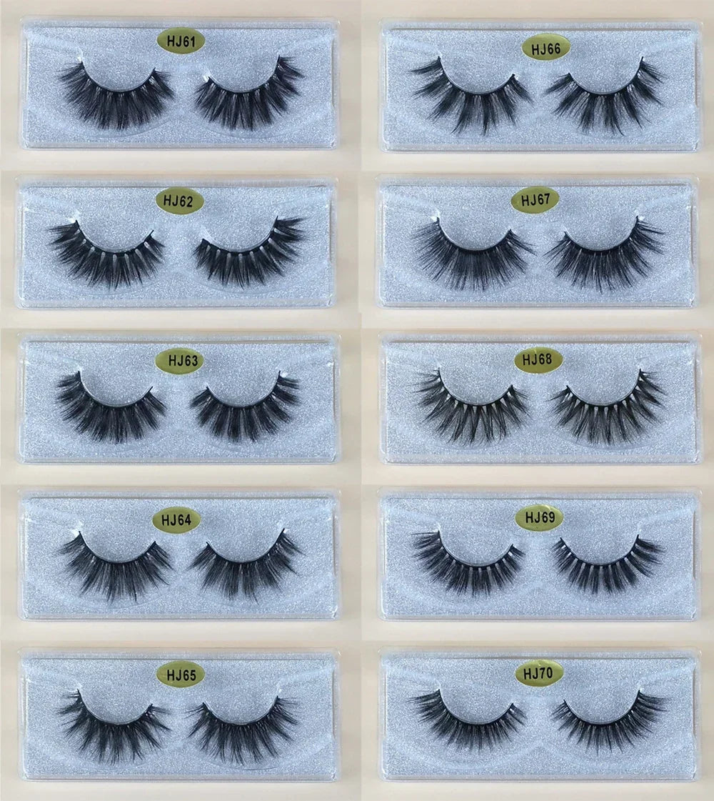 A grid of ten pairs of black mink false eyelashes displayed on clear plastic cards.