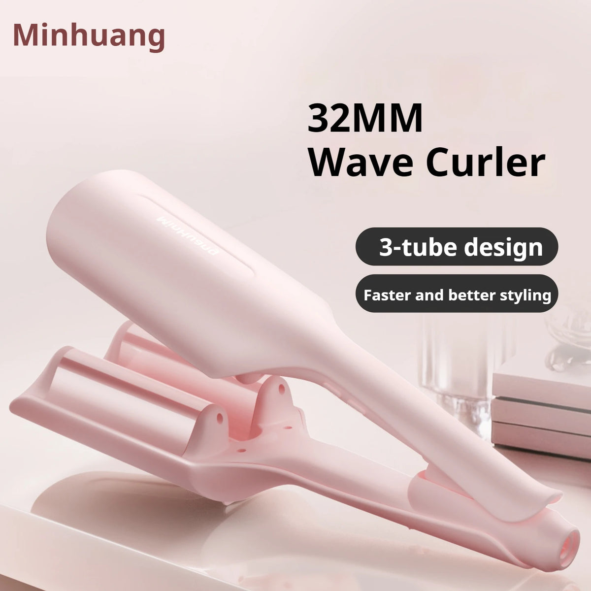 A pink 32MM wave curler with a 3-tube design is shown in a studio setting.
