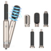 A collection of professional hair dryers and styling brushes in silver and black, including a vertical dryer and various roun