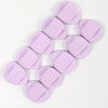 A collection of round, lavender latex-free finger puffs for makeup application.