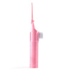 Irrigateur dentaire portable rose manuel à haute pression avec une buse longue et fine.