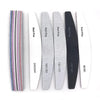 A set of professional nail files with various grits, including fine and coarse options.