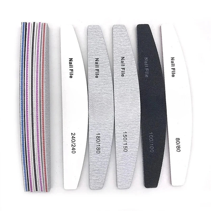 A set of professional nail files with various grits, including fine and coarse options.